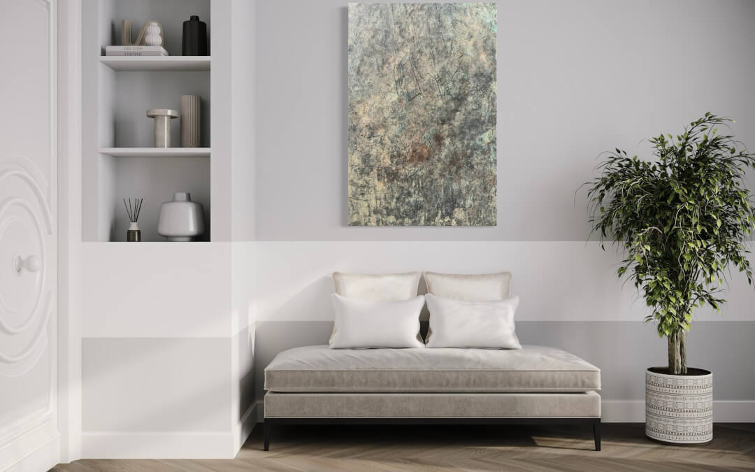 Detailfotografie eines Metalltopfs als Bild über einem grauen Sitzmöbel